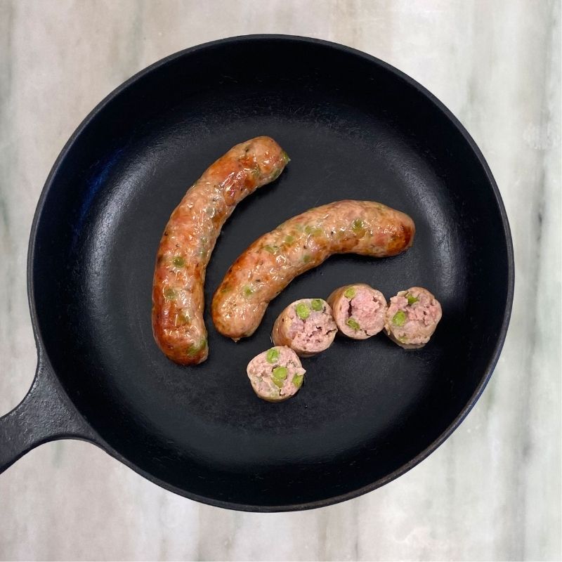 3 sausages with green pea risotto and Parmesan (pork)