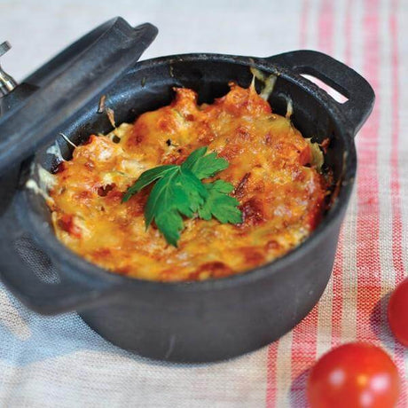 Recette de gratin de ravioles aux courgettes et tomates