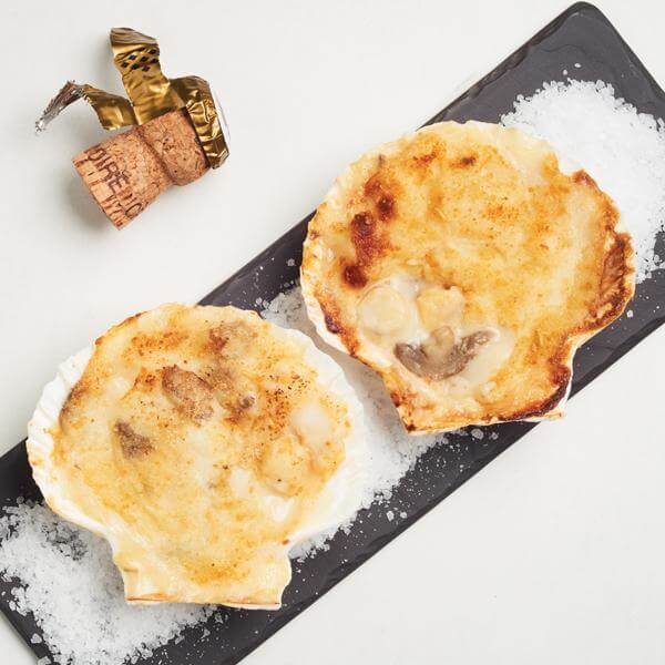 2 coquilles St-Jacques sauce au Champagne